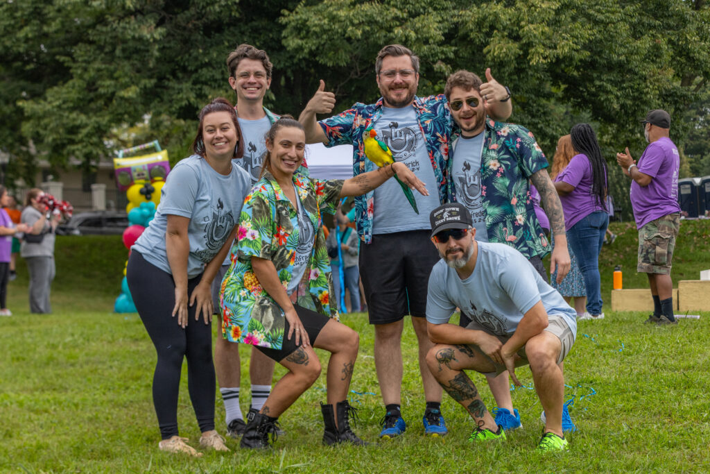 techfrederick Games team posing and wearing matching Hawaiian shirts