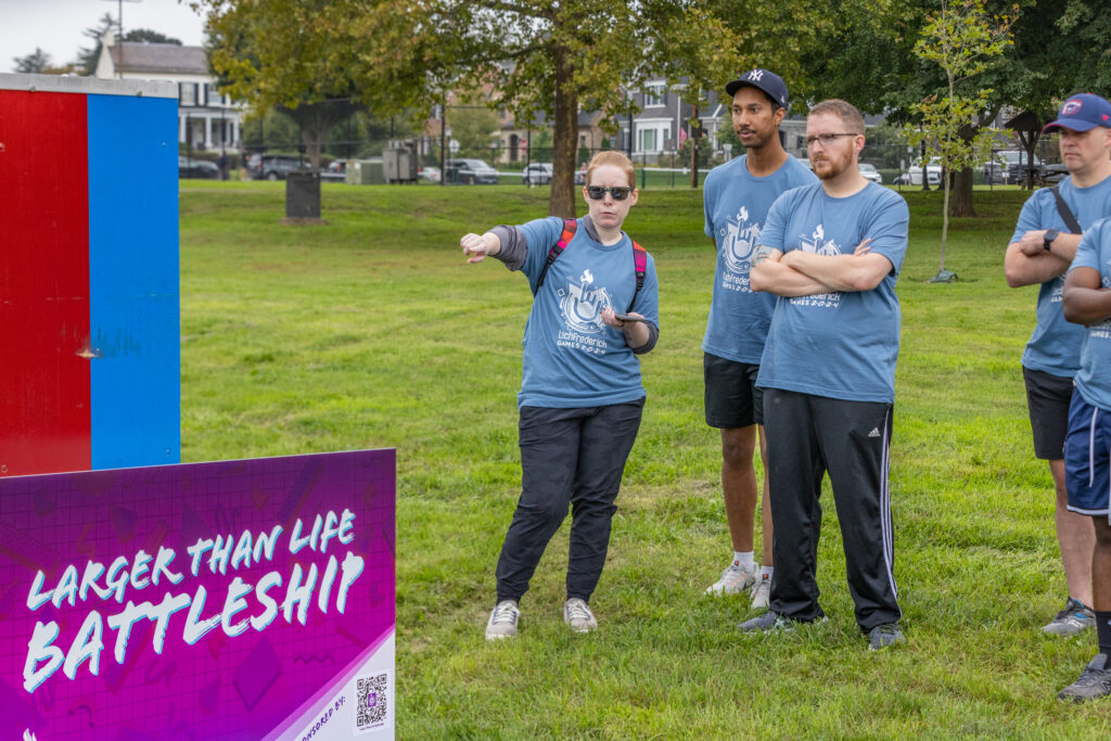 techfrederick Games team strategizing for Larger Than Life Battleship