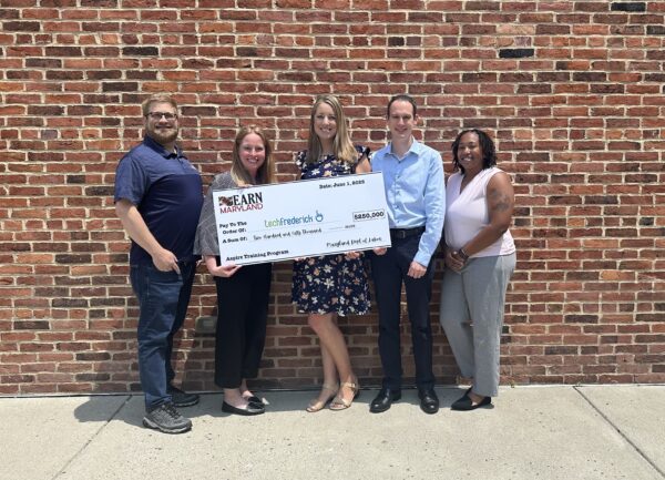 EARN check being presented to techfrederick